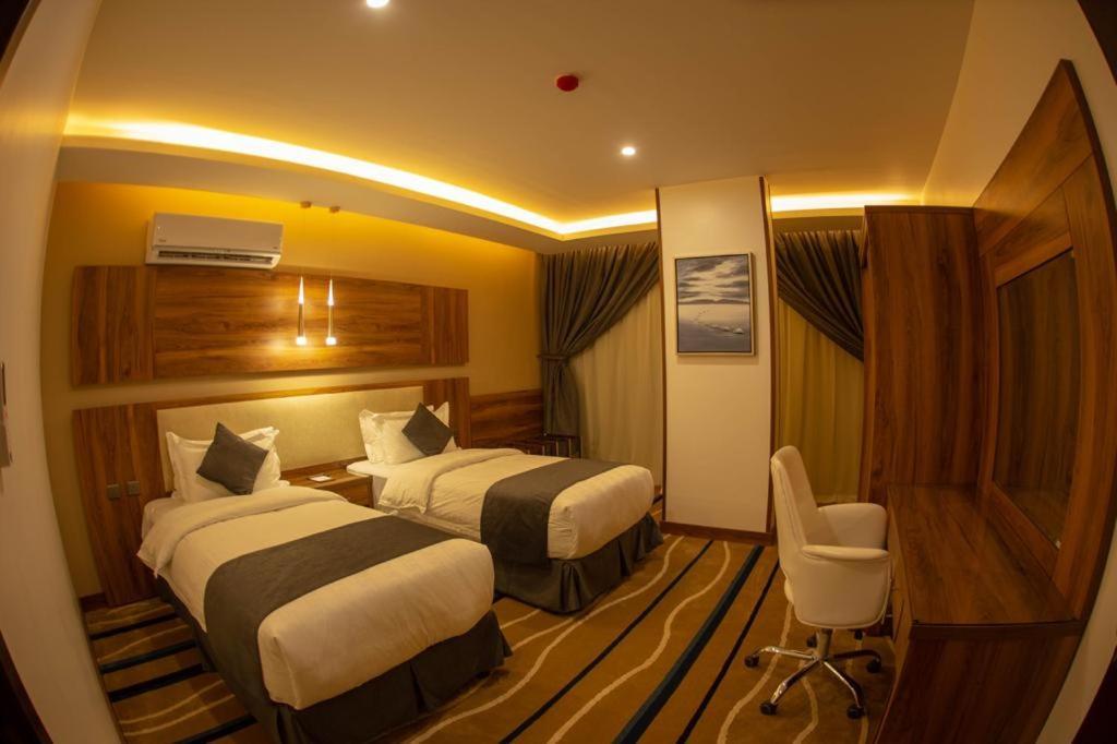 Awj Jazan Suites Hotels Bagian luar foto